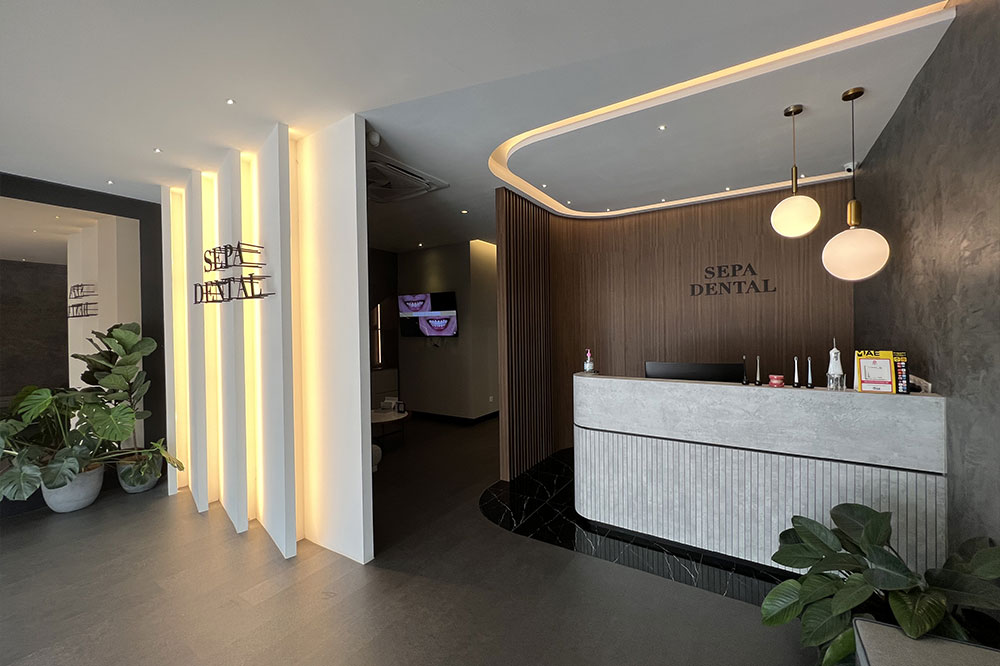 Modern dental clinic hallway with treatment rooms and seating area