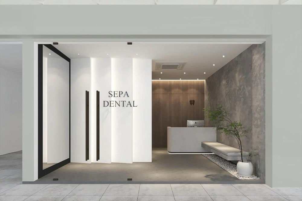 Modern dental clinic hallway with treatment rooms and seating area